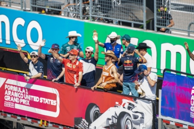 Formula 1 Driver Parade - People on Truck Driving